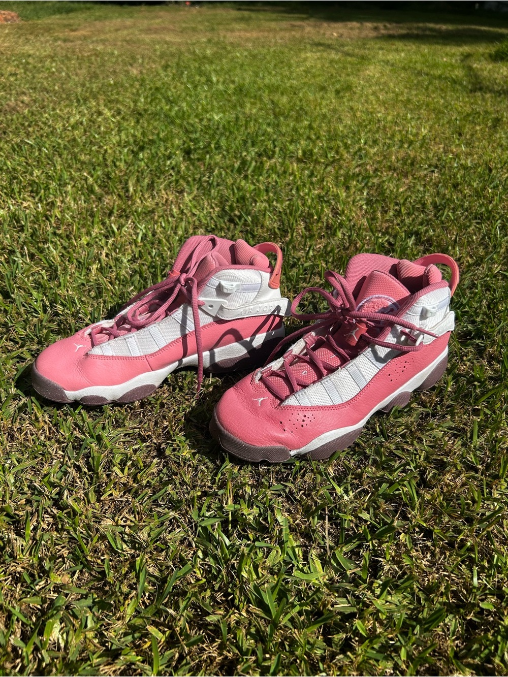 Kids Pink and White High-Top Athletic Sneakers Nike Air Jordan’s 7Y